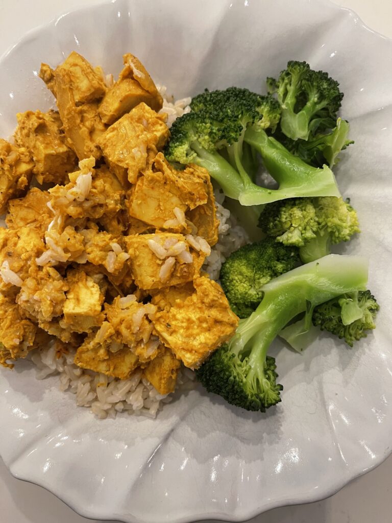 Vadouvan French Tofu Curry in a bowl with broccoli.